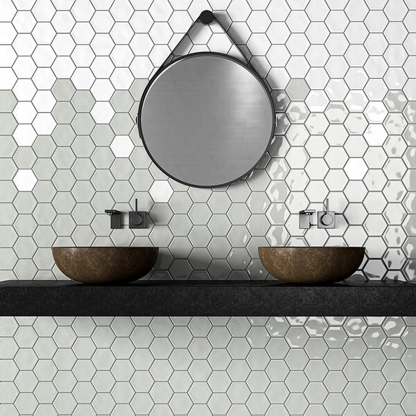 Grey and white hexagon tiles in a bathroom
