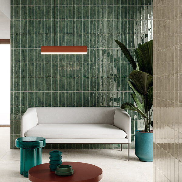 Glossy green porcelain tiles in a living room or lobby